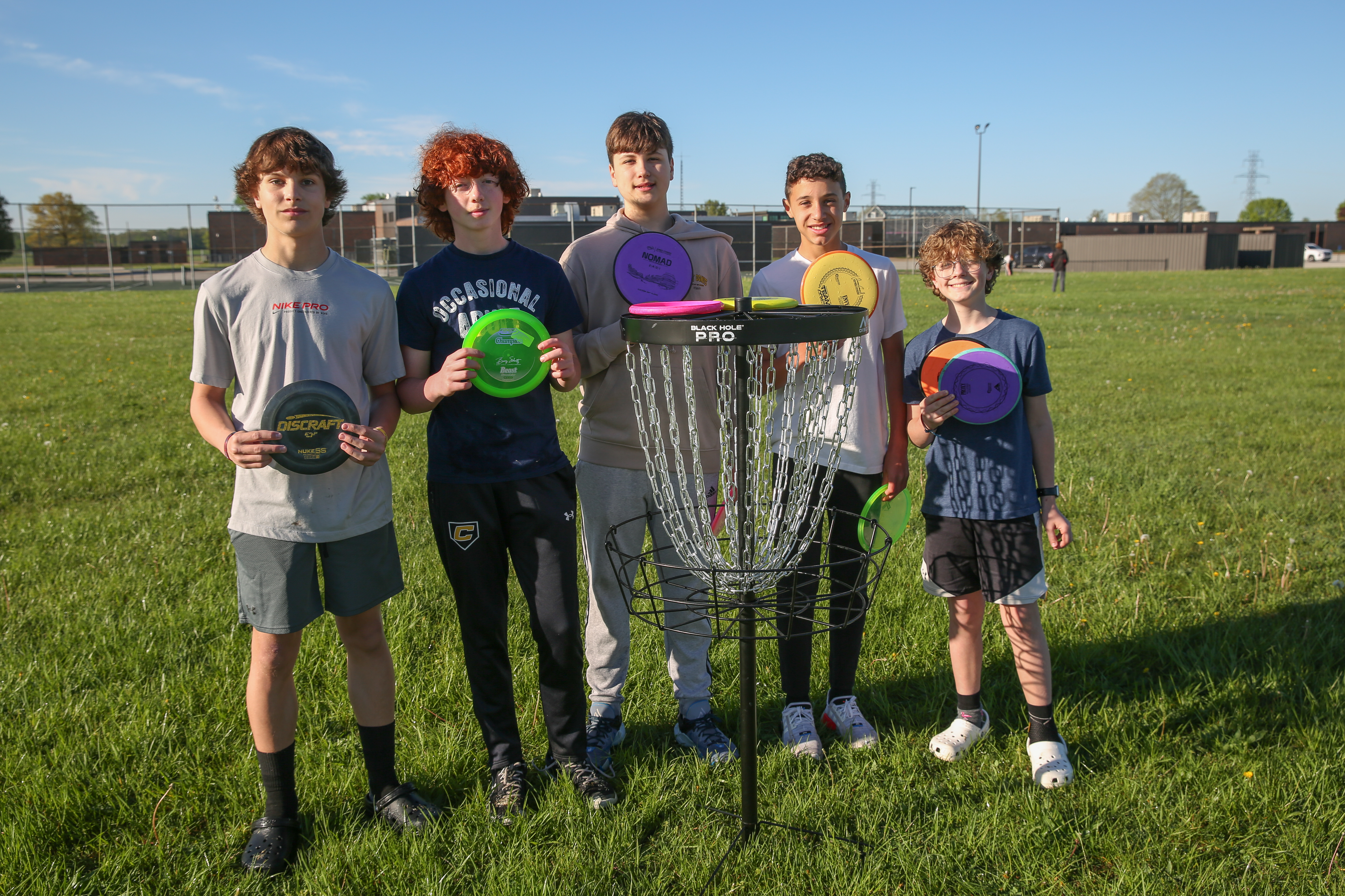 Students in front of Disc Golf Goal