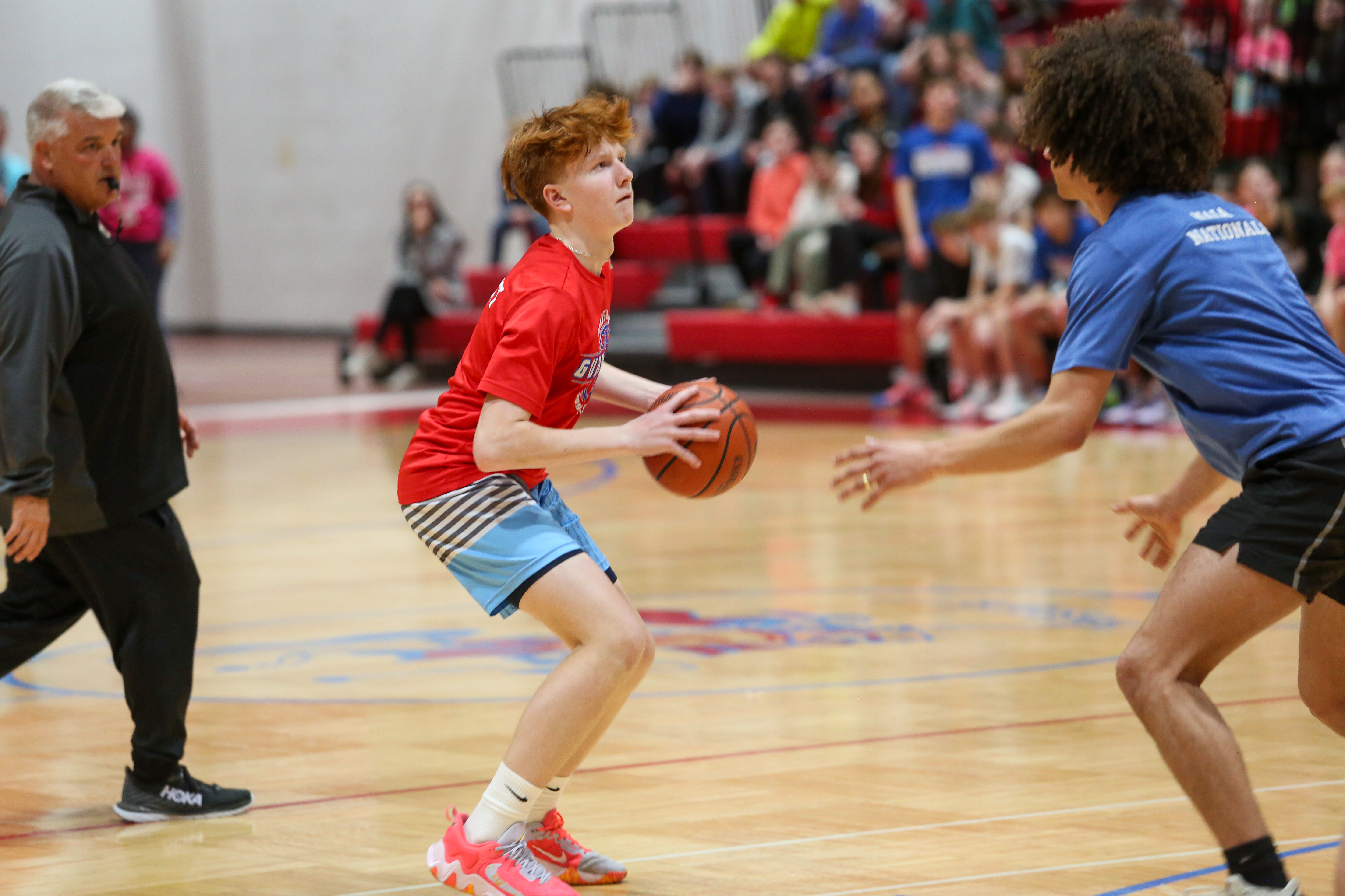 Grissom Student holding basketball