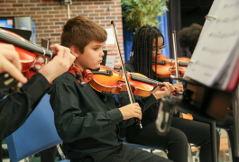 students playing violins